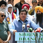 Minister of State for Religious Affairs Khel Das Kohistani along with Sardar Ramesh Singh Arora is talking to the media at Wagah Border