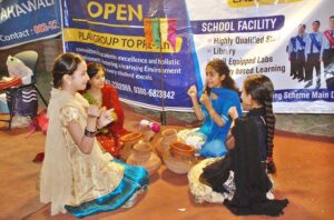 Students performing in the cultural show at the Spring Festival 2025.