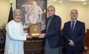 Federal Interior Minister Mohsin Naqvi presents a souvenir to Omani Ambassador Fahad Bin Sulaiman Bin Khalaf Alkharusi during a meeting in federal capital