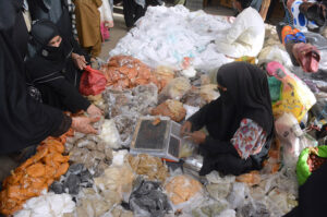 A woman vendor selling spices at Lines Area.