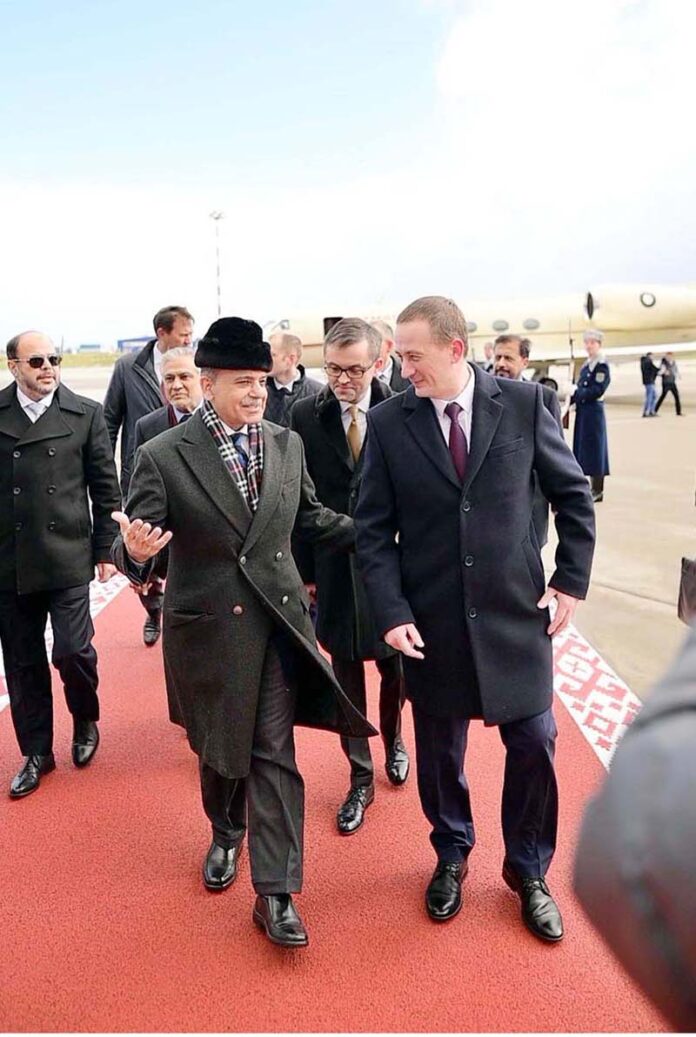 Prime Minister Muhammad Shehbaz Sharif is being received by Prime Minister of Belarus, Alexander Turchin as he arrives at Minsk's International Airport on a two day visit