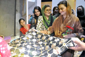 Senior Minister Maryam Aurangzeb and Punjab Information Minister Uzma Bukhari inaugurate the Punjab Industrial Exhibition 2025 at Global Village, with DG PHA Muhammad Tahir Wattoo and other officials present during the event