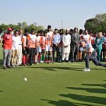 Dutch hockey legend Floris Jan Bovelander provides coaching tips to hockey players during a special training clinic organized by the Khawaja Junaid Hockey Academy (KJHA) at Naseer Bunda Hockey Stadium, Pakistan Sports Complex