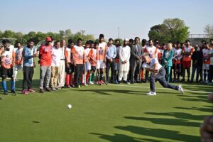 Dutch hockey legend Floris Jan Bovelander provides coaching tips to hockey players during a special training clinic organized by the Khawaja Junaid Hockey Academy (KJHA) at Naseer Bunda Hockey Stadium, Pakistan Sports Complex