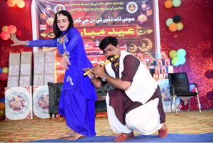 Artists performing on the stage during Eid Function at Shaheed Zulfiqar Ali Bhutto Open Air Theater Arts Council