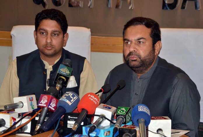 Deputy Commissioner Quetta Saad Bin Asad along with President Quetta Chamber of Commers Ayub Maryani addressing a press conference regarding the issues of business communities