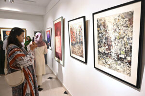 Visitors of art lover keenly observe a masterpiece by renowned artists Abid Hasan, Imran Hunzai, Aftab Ahmed, Mansoor Rahi, Ajab Khan, Mansur Aye, Akram Dost, Maqsood Ali, Akram Spaul, Mobina Zuberi, Ali Abbas, Mona Naqsh, Anila Zulfiqar, Mutaib Shah, Arjumand Faisel, Nazir Ahmed, Arshad Maqbool, Sadequian, A. S. Rind, Safwan bshir, Ather Jamal, Samra Cheema, Ann Raza, Shahla Rafi, Bin Qulander, Shiblee Munir, Farrukh Shahab, Unab Sumbal, Hajra Mansoor, Wahab Jaffer an Art exhibition after opening reception of 17th Anniversary Exhibition at Gallery 6 in federal Capital
