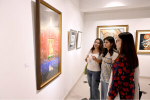 Visitors of art lover keenly observe a masterpiece by renowned artists Abid Hasan, Imran Hunzai, Aftab Ahmed, Mansoor Rahi, Ajab Khan, Mansur Aye, Akram Dost, Maqsood Ali, Akram Spaul, Mobina Zuberi, Ali Abbas, Mona Naqsh, Anila Zulfiqar, Mutaib Shah, Arjumand Faisel, Nazir Ahmed, Arshad Maqbool, Sadequian, A. S. Rind, Safwan bshir, Ather Jamal, Samra Cheema, Ann Raza, Shahla Rafi, Bin Qulander, Shiblee Munir, Farrukh Shahab, Unab Sumbal, Hajra Mansoor, Wahab Jaffer an Art exhibition after opening reception of 17th Anniversary Exhibition at Gallery 6 in federal Capital