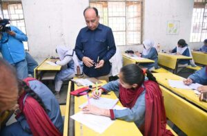 Chairman of the Board of Secondary Education Karachi, Mr. Ghulam Hussain Soho, visits students appearing in the annual SSC (Part-II) examinations during the first paper.