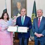 Prime Minister Muhammad Shehbaz Sharif presenting certificate of appreciation to Ms Saima Naureen, Project Director HEC in recognition of her exemplary performance in sending Agriculture trainees to China