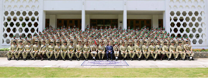 Prime Minister Muhammad Shehbaz Sharif, Chief of Army Staff General Syed Asim Munir (NIM) and officers of PMA Kakul in a group photo with the graduating officers of 151st Long Course at PMA Kakul