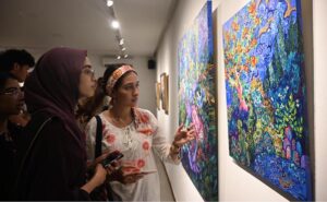 Visitors viewing the photo exhibition 'The Quiet Storm'—a powerful group show featuring seven visionary artists whose works reflect subtle intensity and precision, at Tanzara Gallery, Saidpur Village