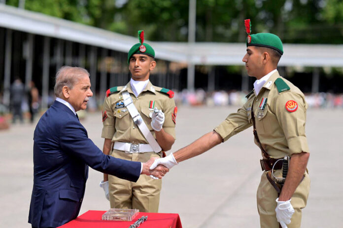 Prime Minister Muhammad Shehbaz Sharif giving awards to the high achievers of 151st Long Course at the passing out Ceremony held at PMA Kakul