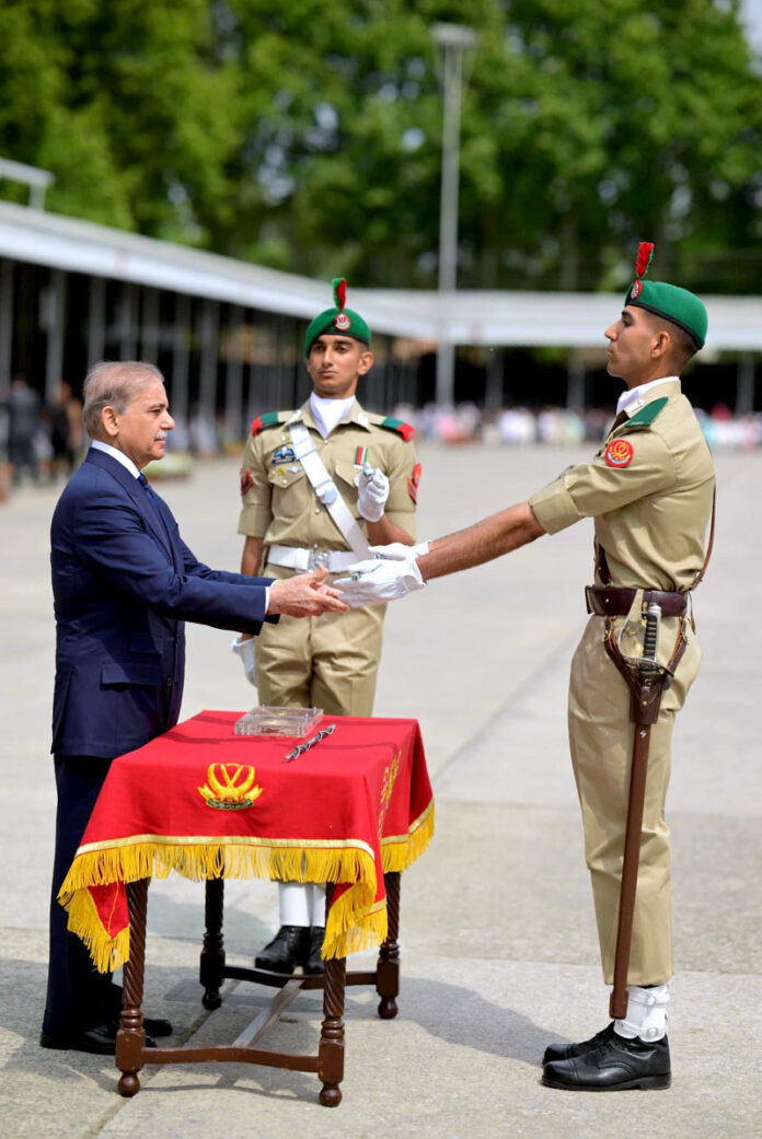 Prime Minister Muhammad Shehbaz Sharif giving awards to the high achievers of 151st Long Course at the passing out Ceremony held at PMA Kakul