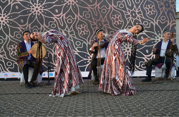 Artists performing a cultural show organized by the Embassy of Uzbekistan in Pakistan and the Tourism Committee of Uzbekistan during the 