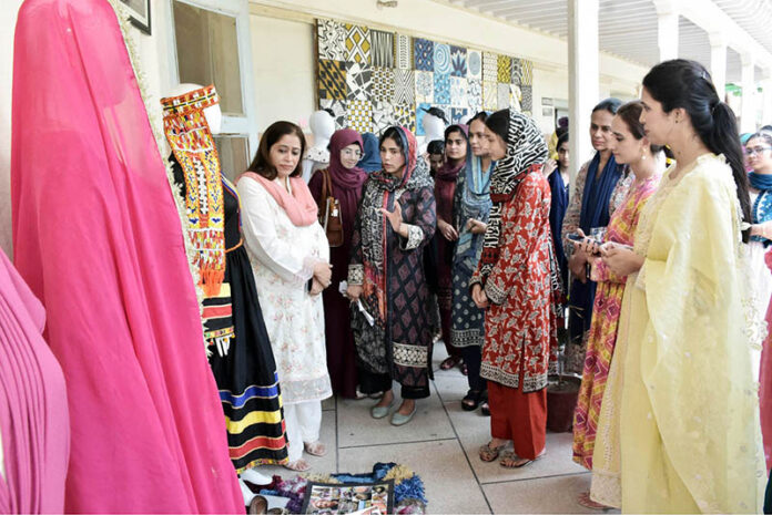 Students visiting a stalls during Institute of Home Sciences staged projects exhibition at University of Agriculture Faisalabad (UAF)