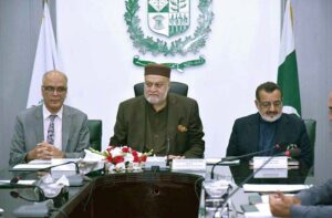 Federal Minister for Poverty Alleviation and Social Safety Sayed Imran Ahmed Shah being briefed by the MD Pakistan Bait ul Maal during his visit to the Headquarters of PBM. Secretary Poverty Alleviation and Social Safety Mr۔ Naveed Ahmed sheikh is Also present.