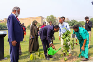 Ambassador of Somalia to Pakistan His Excellency Sheikh Noor Mohammed Hassan is planting a sapling during his visit to The University of Faisalabad (TUF)