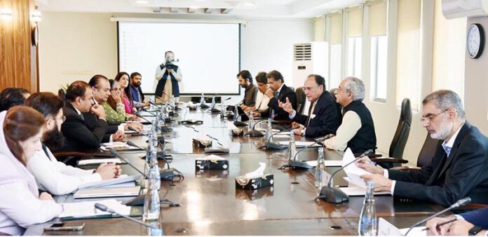 Finance Minister Senator Muhammad Aurangzeb chairs a high-level meeting on the Social Impact Financing Framework at the Finance Division
