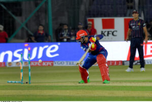 Islamabad United Batter Shadab Khan looks after playing a shot during the Pakistan Super League (PSL) Twenty20 cricket match between Karachi Kings and Islamabad United at the National Stadium.