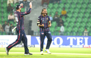 Karachi Kings bowler Hassan Ali celebrates the wicket of Quetta Gladiators Fin Allen during the Pakistan Super League PSL-X T20 cricket match between Quetta Gladiators and Karachi Kings at the Gaddafi Cricket Stadium