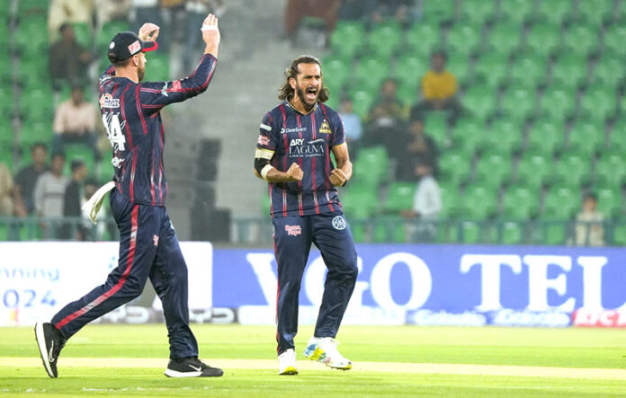 Karachi Kings bowler Hassan Ali celebrates the wicket of Quetta Gladiators Fin Allen during the Pakistan Super League PSL-X T20 cricket match between Quetta Gladiators and Karachi Kings at the Gaddafi Cricket Stadium