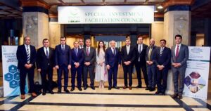 H.E. Mikayil Jabbarov, Azerbaijan's Minister of Economy, along with his delegation, poses for a group photo with senior officials of the Special Investment Facilitation Council (SIFC) during their visit to the SIFC.