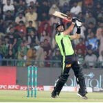 Lahore Qalanders batter Sikander Raza playing shot during the Pakistan Super League PSL-X T20 cricket match between Lahore Qalanders and Peshawar Zalmi at the Gaddafi Cricket Stadium
