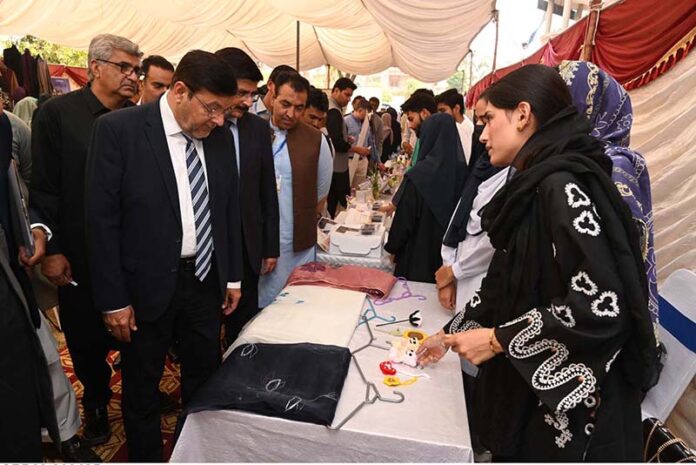 Vice Chancellor University of Sargodha Professor Dr. Qaiser Abbas visiting different stalls after inaugurating Second Annual CEO Forum Future Graduate Skills for Job Market organized by Malik Feroz Khan Noon Business school University of Sargodha