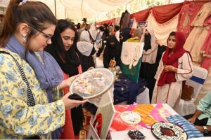 Vice Chancellor University of Sargodha Professor Dr. Qaiser Abbas visiting different stalls after inaugurating Second Annual CEO Forum Future Graduate Skills for Job Market organized by Malik Feroz Khan Noon Business school University of Sargodha