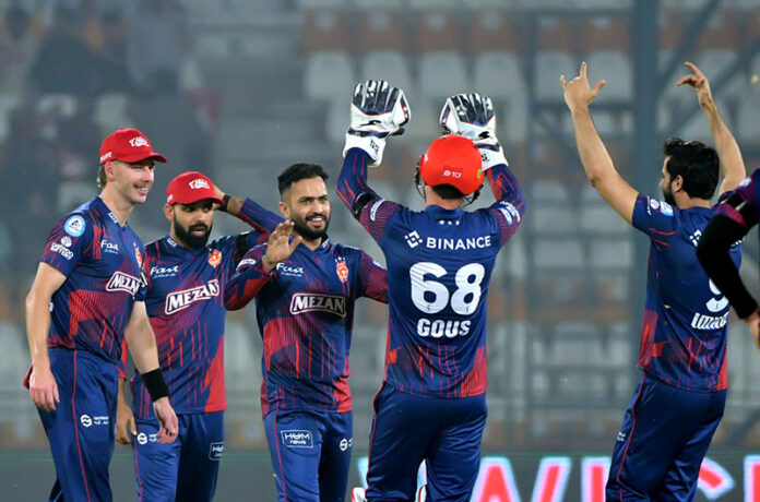 Islamabad United bowler Muhammad Nawaz with teammates celebrate the wicket of Multan Sultans batsman Yasir Khan during the PSL-X T20 cricket match between Multan Sultans and Islamabad United at the Multan Cricket Stadium