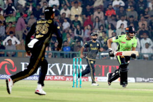 Lahore Qalanders batter Sikander Raza playing shot during the Pakistan Super League PSL-X T20 cricket match between Lahore Qalanders and Peshawar Zalmi at the Gaddafi Cricket Stadium