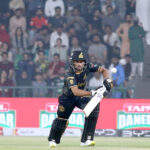 Peshawar Zalmi Player Muhammad Haris playing shot during the Pakistan Super League PSL-X T20 cricket match between Lahore Qalanders and Peshawar Zalmi at the Gaddafi Cricket Stadium