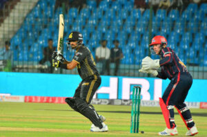 Peshawar zalmi Babar Azam plays a shot during the Pakistan Super League (PSL) Twenty20 cricket match between Karachi Kings and Peshawar zalmi at the National Stadium.