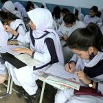 Students solving question paper during annual examination of HSC (Part-II) 2025 at Hayat Girls Collage