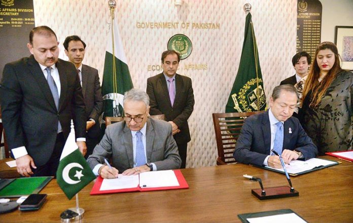 Dr. Kazim Niaz, Secretary Economic Affairs, and Akamatsu Shuichi, Ambassador of Japan, signing Economic and Social Development Program for provision of smart water meters