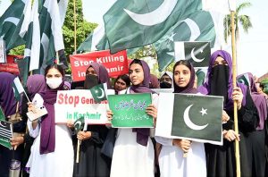 Students participate in a rally in support of the Pakistan Army as the nation observed Youm-i-Tashakar on Friday across the country to honour the armed forces and the people for their victory in Operation Bunyan-um-Marsoos against India at the University of Sargodha