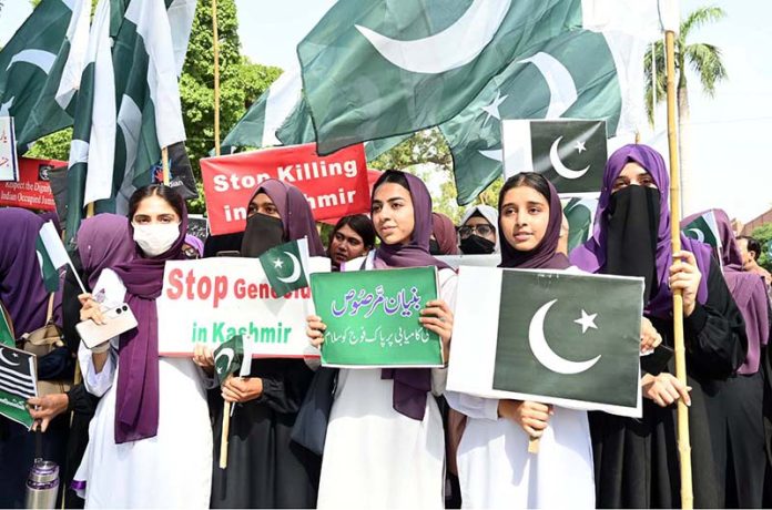 Students participate in a rally in support of the Pakistan Army as the nation observed Youm-i-Tashakar on Friday across the country to honour the armed forces and the people for their victory in Operation Bunyan-um-Marsoos against India at the University of Sargodha