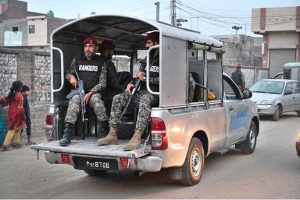 Security officials patrolling outside the Government Health and Educational Complex in Muridke, about 30 kilometers from Lahore, following Indian airstrikes