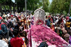 A large number of civil society members laying flowers and offer Duaa at the grave of Dr. Abdul Qadeer Khan observing Youm-E-Takbeer at H-8 graveyard