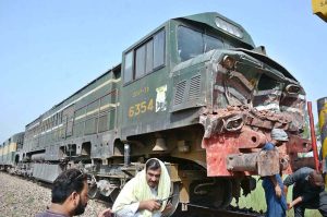 Workers of Pakistan Railways are busy repairing the railway track after the Shalimar Express passenger train collided with a bricks-loaded tractor trolley near RB-142 Choti Ghartal, Sahianwala Interchange near Chak Jhumra