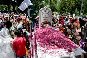A large number of civil society members laying flowers and offer Duaa at the grave of Dr. Abdul Qadeer Khan observing Youm-E-Takbeer at H-8 graveyard