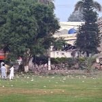 Rescue workers carry out search and rescue operations at the Government Health and Educational Complex in Muridke, about 30 kilometers from Lahore, following Indian airstrikes