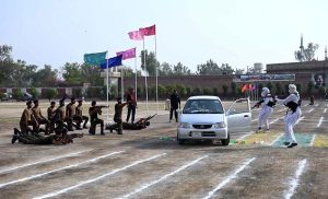 RPO Sargodha Muhammad Shahzad Asif Khan and Principal of Police Training School Sargodha, Dr. Anam Faryal Afzal, review the parade during the passing out ceremony of the 94th Basic Recruit Course at Police Training School Sargodha