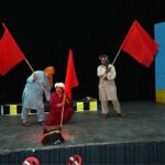 Artists performing in drama titled' Mazdoor Kahani' on the eve of Labour Day organized by Sargodha Arts Council