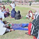 A BISP beneficiary woman fell unconscious on an open ground in scorching weather due to the lack of shade and seating facilities at the BISP Cash Distribution Center in Government School No. 02