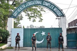 Security officials standing high alert outside the Government Health and Educational Complex, about 30 kilometers from Lahore, following Indian airstrikes