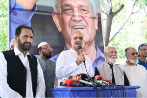 Amir Jamaat e Islami, Hafiz Naeem ur Rehman along with others talking media at the grave of Dr. Abdul Qadeer Khan to pay him tribute on Youm-E-Takbeer at H-8 graveyard