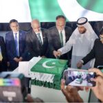 Federal Minister for Planning, Development and Special Initiatives, Professor Ahsan Iqbal, Ambassador Faisal Niaz Tirmizi, H.E. Khalid Muhammad Al-Kaabi, Ministry of Foreign Affairs, Dubai Office, Consul General Hussain Muhammad and others at the cake cutting ceremony on the occasion of Pakistan Day Reception