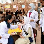 Doctor of LUMHS providing health awareness to students of Govt. Sachal Education Academy during health care medical camp organized by Liaquat University of Medical & Health Sciences Jamshoro